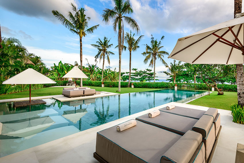 The estate — poolside, steps from the beach